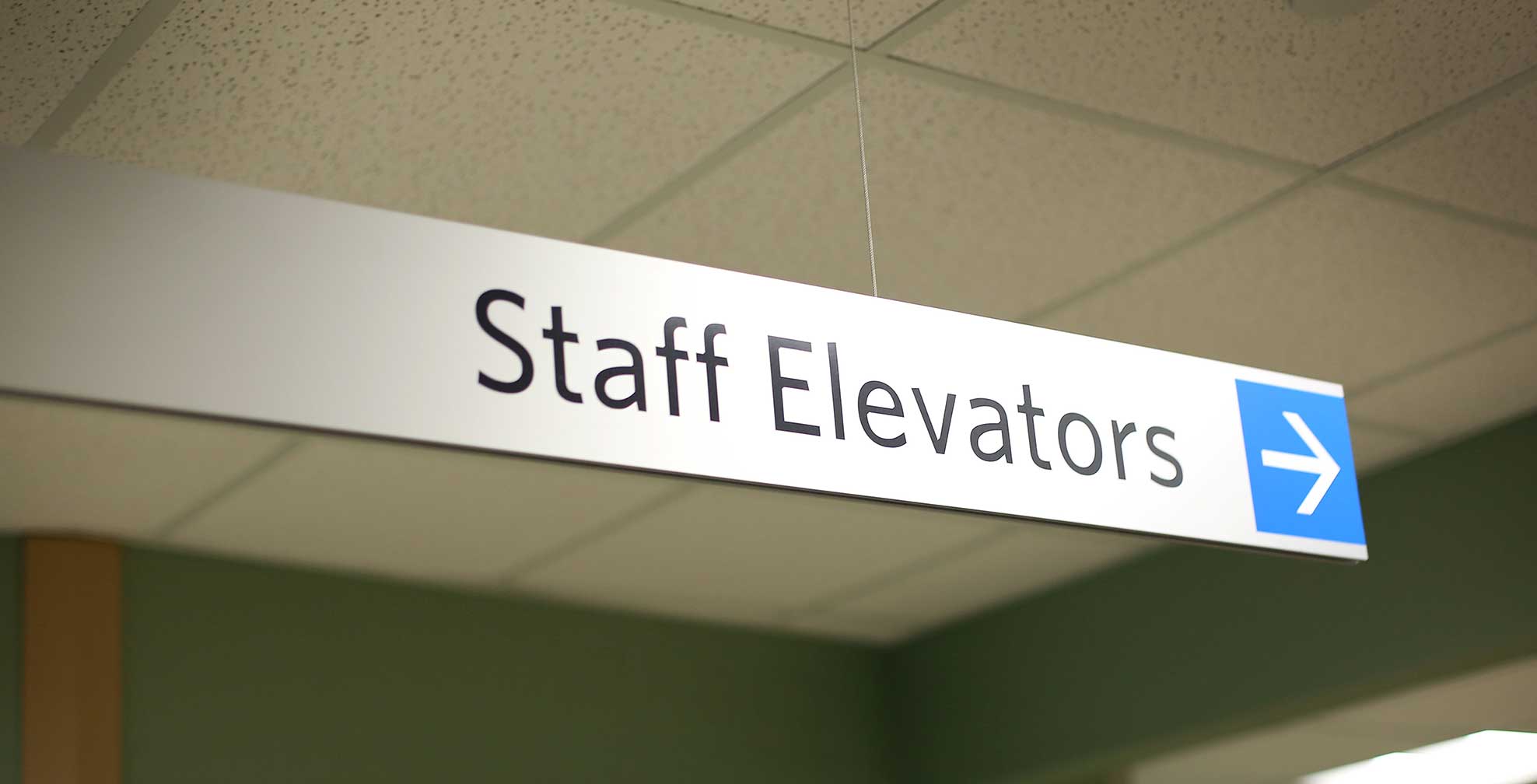 spectrum-health-system_staff-elevators-overhead-sign.jpg Art Direction by: Bart Crosby, Crosby Associates